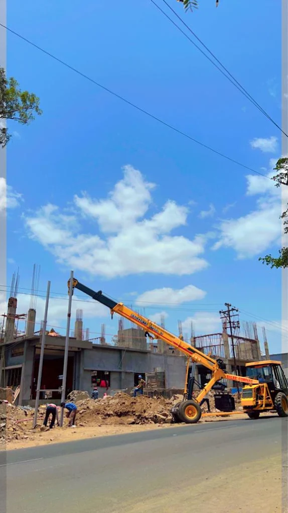 Heavy duty crane erecting electrical utility structures